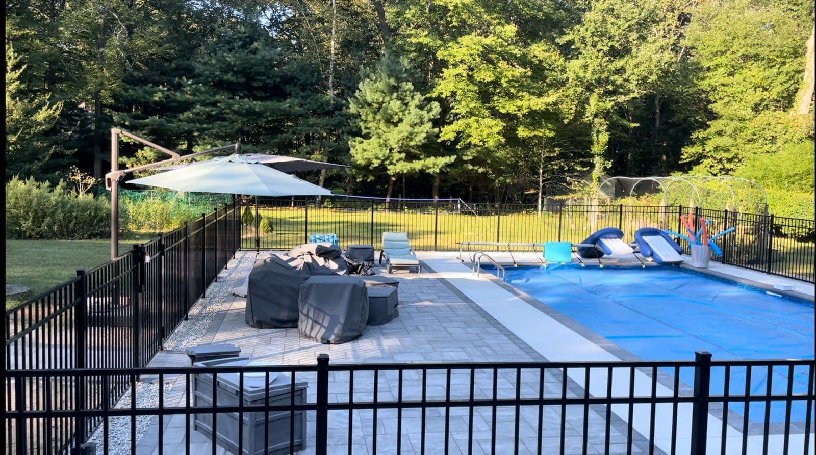Backyard Pool Deck and Fence Installation