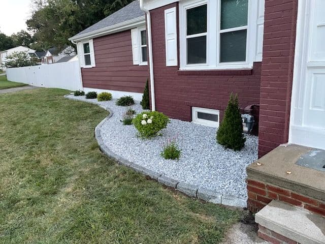 Residential Landscape Design with Cobblestone Edging