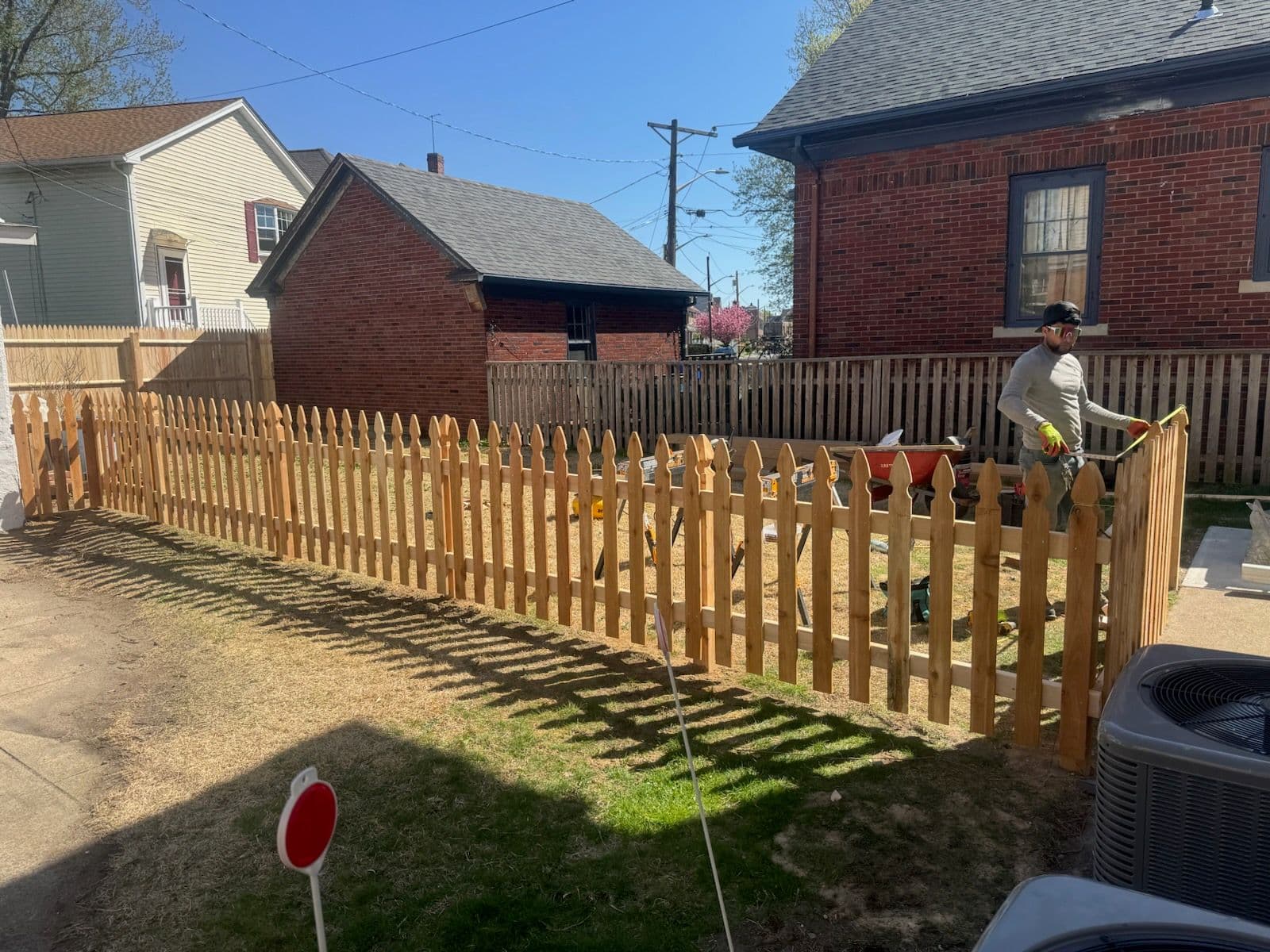 Charming Wooden Picket Fence Installation
